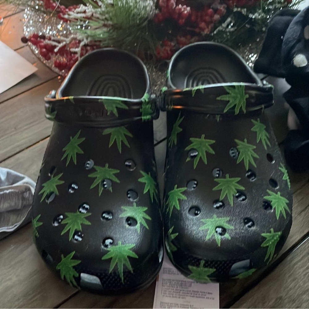 CROCS Black Clogs with Green Leaf Design